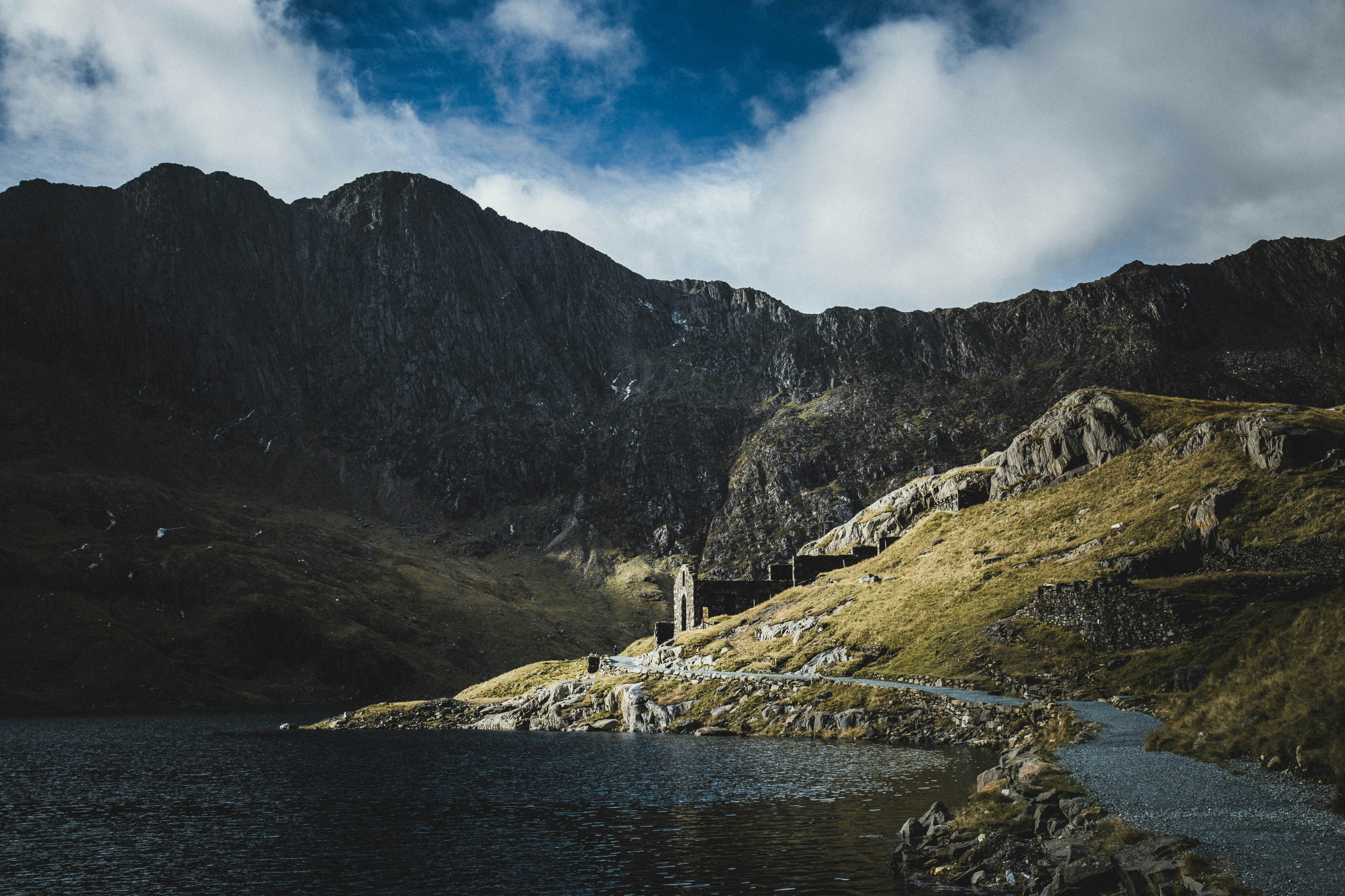 Ruins of the Britannia Copper Works beside Llyn Llydaw in the Snowdonia mountains, Wales